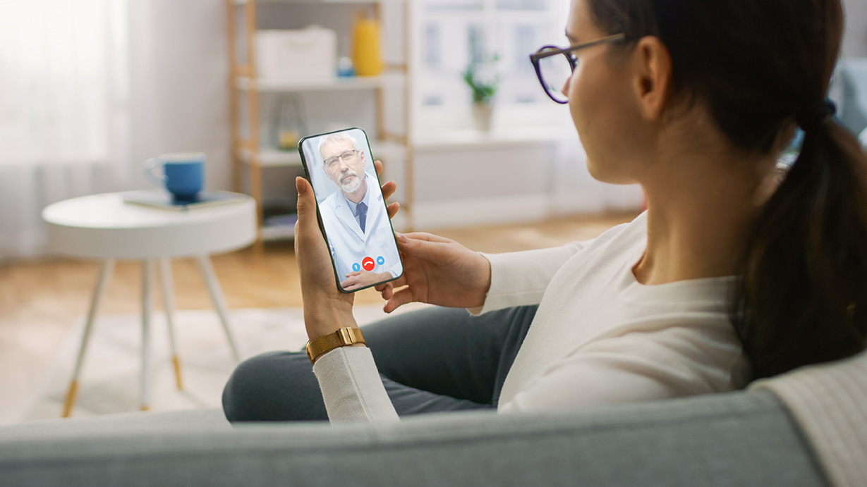 woman doing telehealth visit from her phone